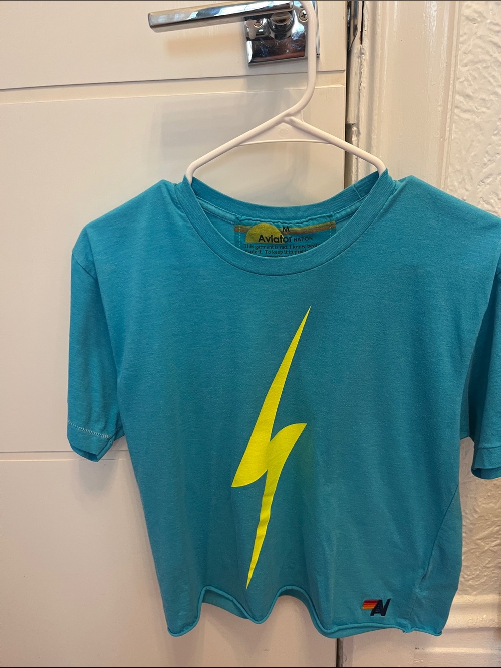 Aviator Nation women’s boyfriend crop T-shirt blue with yellow lightning bolt